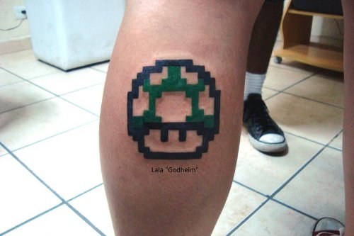 Amazing Green Ink Mushroom Tattoo On Back Leg