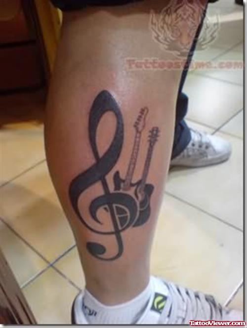 Music And Guitar Tattoo On Leg