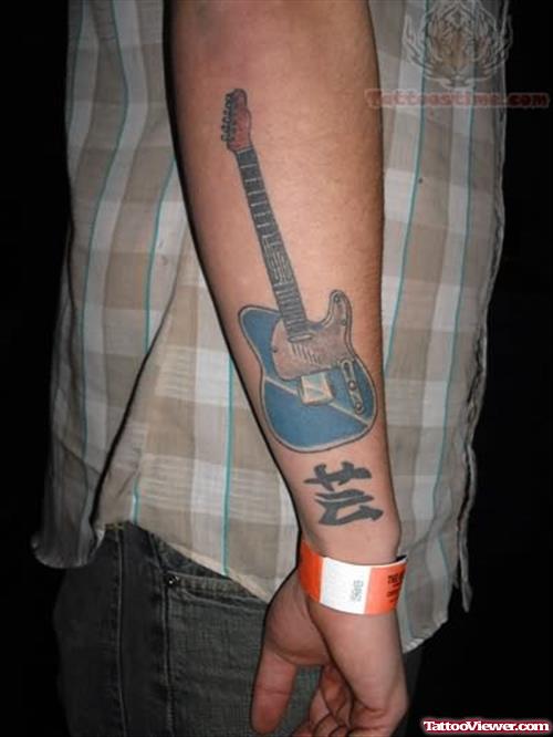 Blue Ink Guitar Tattoo On Arm