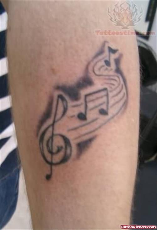 Music Notes Arm Tattoo