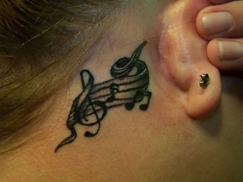 Grey Ink Music Tattoo Behind Ear