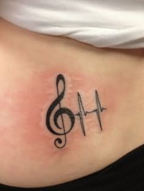 Music Tattoo on Left Lowerback