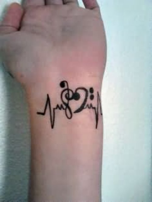 Awesome Music Tattoo on Left Wrist
