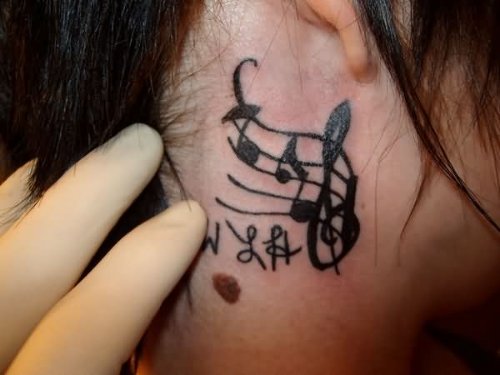 Music Tattoo On Girl Side Neck