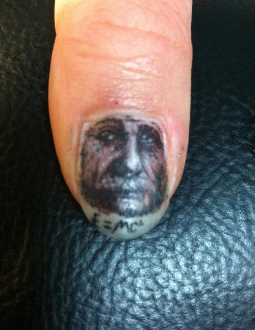 Einstein Face Tattoo On Nail