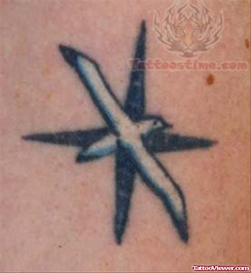 Nautical Star And Bird Tattoo