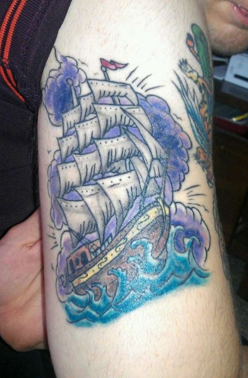 Color Navy Tattoo On Left Bicep