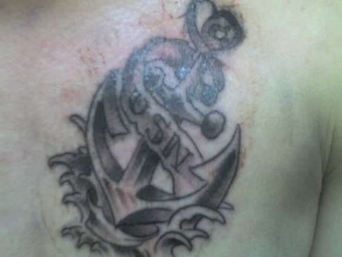 Grey Ink Navy Anchor Tattoo On Man Chest