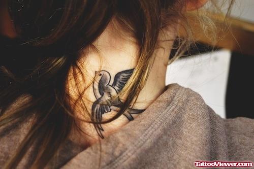 Grey Ink Flying Bird Neck Tattoo