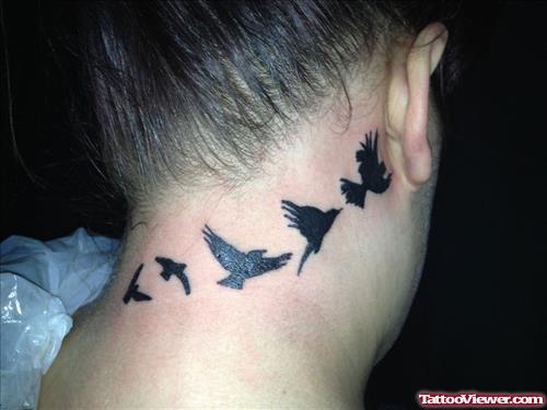 Amazing Black Flying Birds Neck Tattoo