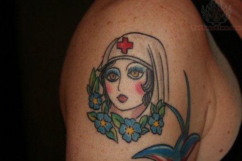 Blue Flowers And Nurse Tattoo On Shoulder