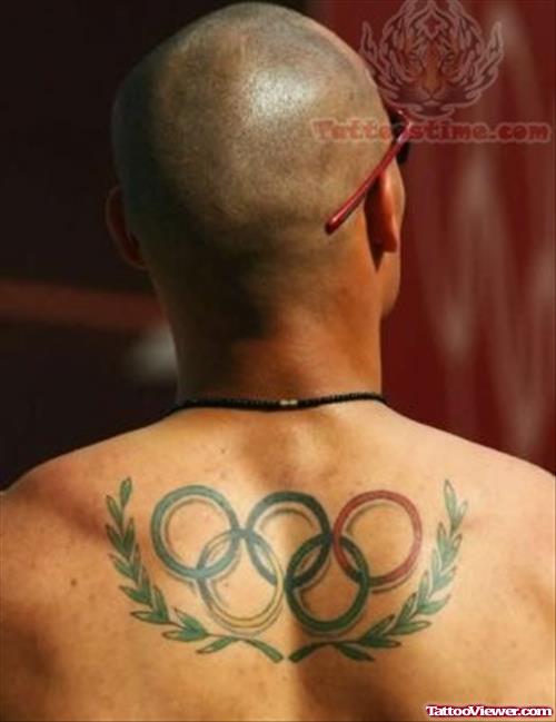 Andres Bayron Silva Showing Olympic Tattoo