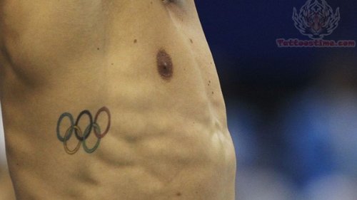 Olympic Tattoo On Side Rib