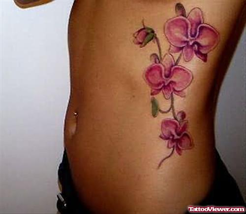 Orchid Flower Tattoo On Side Rib