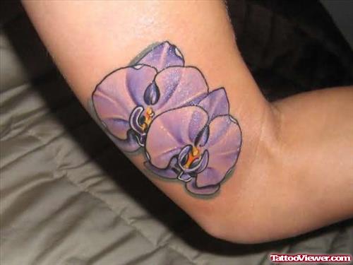 Orchid Flower Tattoo On Bicep