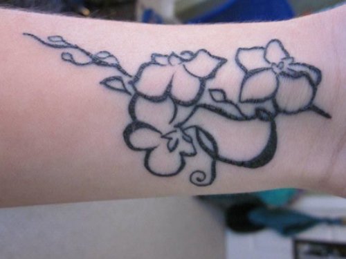 Outline Orchid Flower Tattoos On Left Wrist