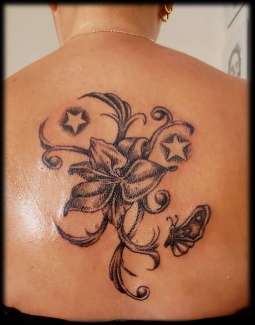Grey Ink Stars and Orchid Tattoo On Back
