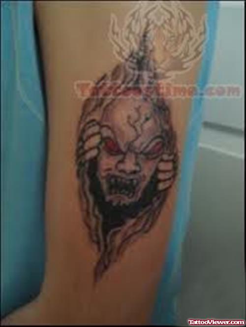 Scary Tattoo On Bicep