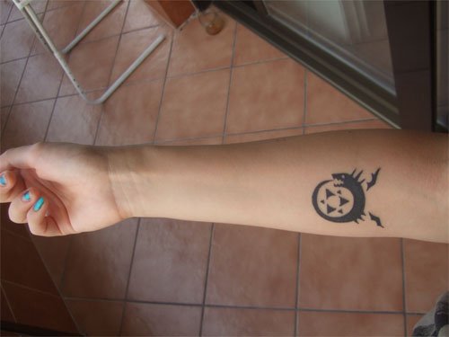 Right Forearm Ouroboros Tattoo