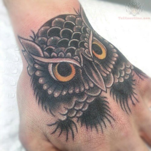 Yellow Eyed Owl Tattoo On Hand