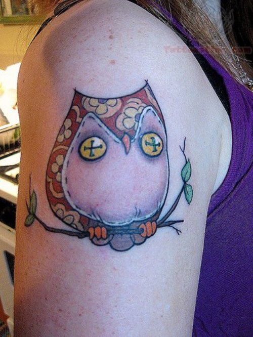 Owl With Yellow Button Eyes Tattoo On Bicep