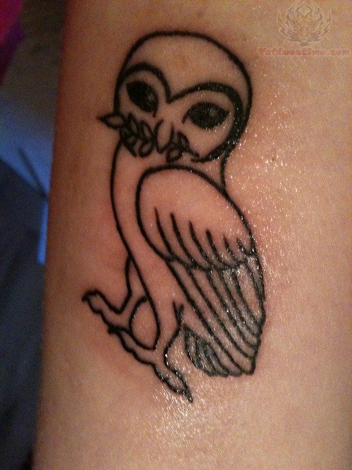 Owl With Leaf In Beak Tattoo
