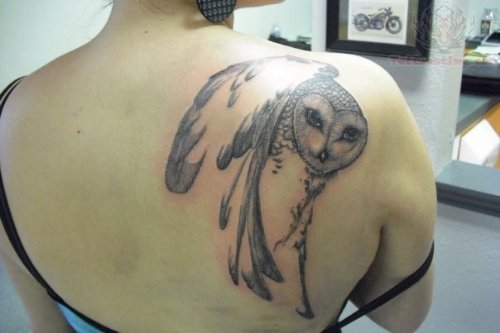 Large Feathers And Owl Head Tattoo