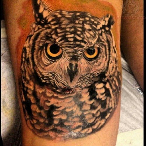 Owl Head With Yellow Eyes Tattoo