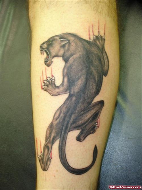 Grey Ink Panther Tattoo On Leg