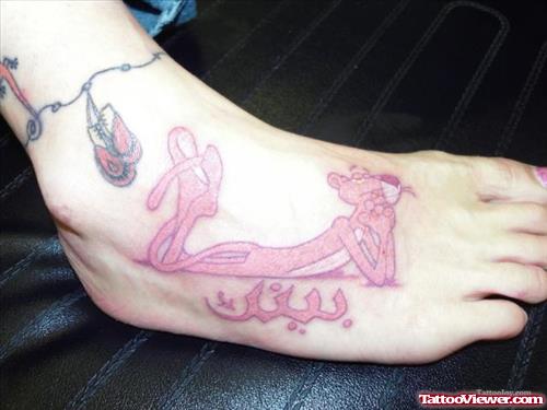 Arabic And Pink Panther Cartoon Tattoo on Foot