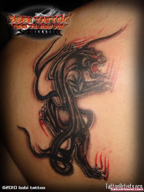 Ripped Skin Panther Tattoo On Back Shoulder