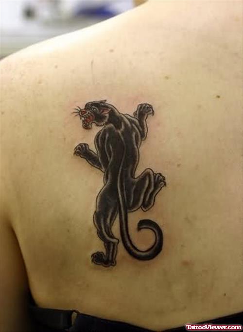 Black Ink Panther Tattoo On Back