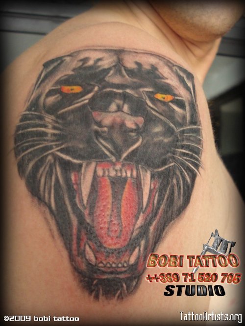 Yellow Eyes Panther Head Tattoo On Right Shoulder