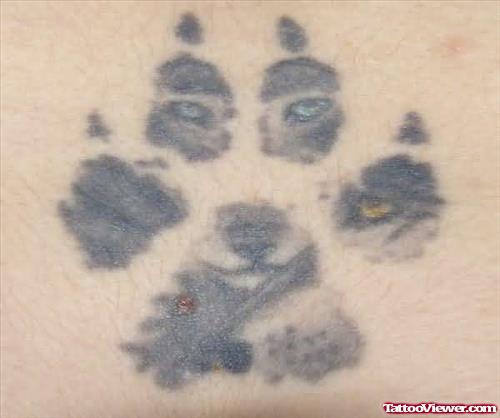 Bright Wolf Paw Tattoo
