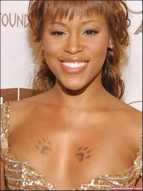 Rapper Eve Shows Off Her Paw Print Tattoos