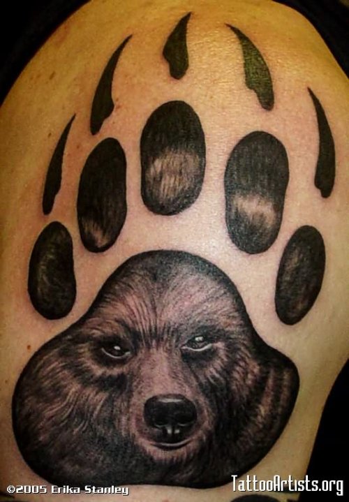 Wolf Face In Bear Paw Tattoo