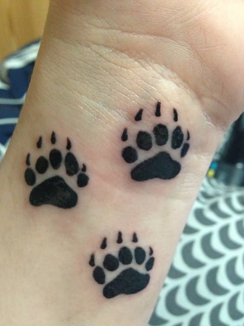 Amazing Black Paw Tattoos On Left Wrist