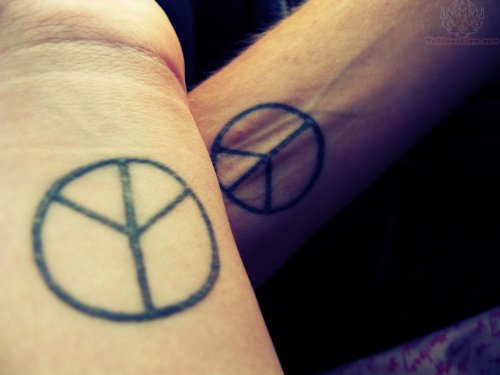 Peace sign Tattoos On Wrist