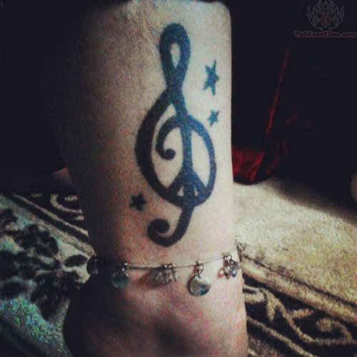 stars and Peace Sign Tattoo On Wrist