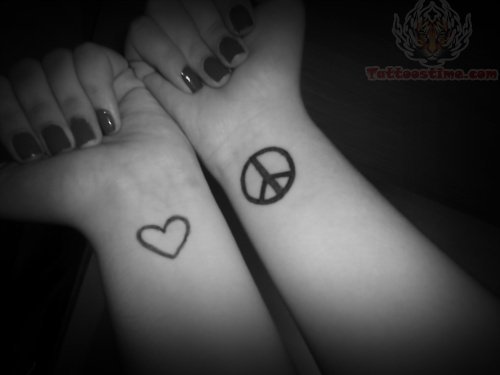 Heart And Peace Sign Tattoos On Wrists