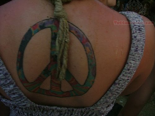 Peace Sign Tattoo On Girl Upperback