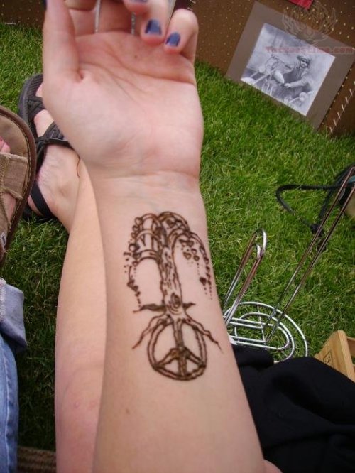 Peace Tree Tattoo On Girl Arm