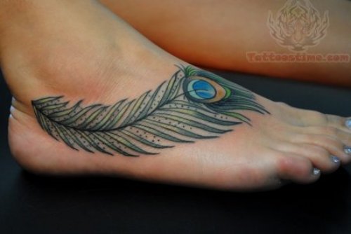 Amazing Peacock Feather Tattoo On Girl Foot