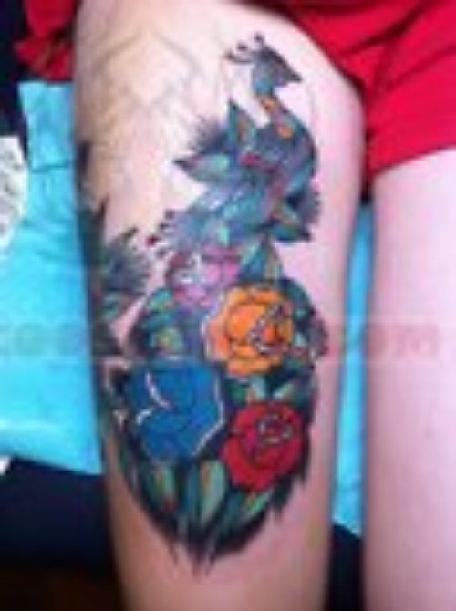 Flowers And Peacock Tattoo On Right Thigh