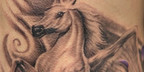 Amazing Grey Ink Pegasus Tattoo