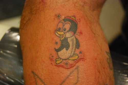 Beautiful Color Ink Penguin Tattoo On Leg
