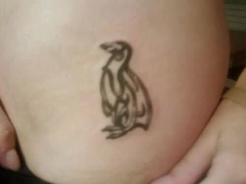 Side Rib Penguin Tattoo For Girls