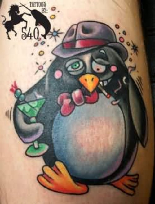 Black Ink Penguin Tattoo On Bicep