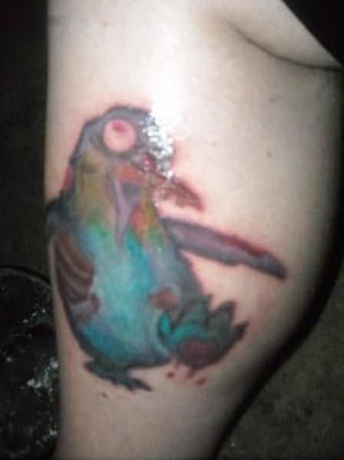 Color Ink Penguin Tattoo On Back Leg
