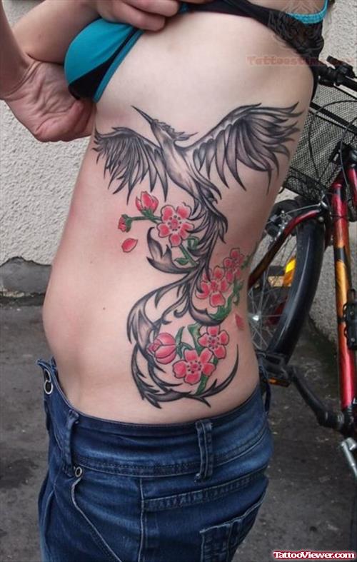 Flowers And Phoenix Tattoo On Side Rib